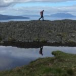 Walking on Eigg with Rum in the background featured